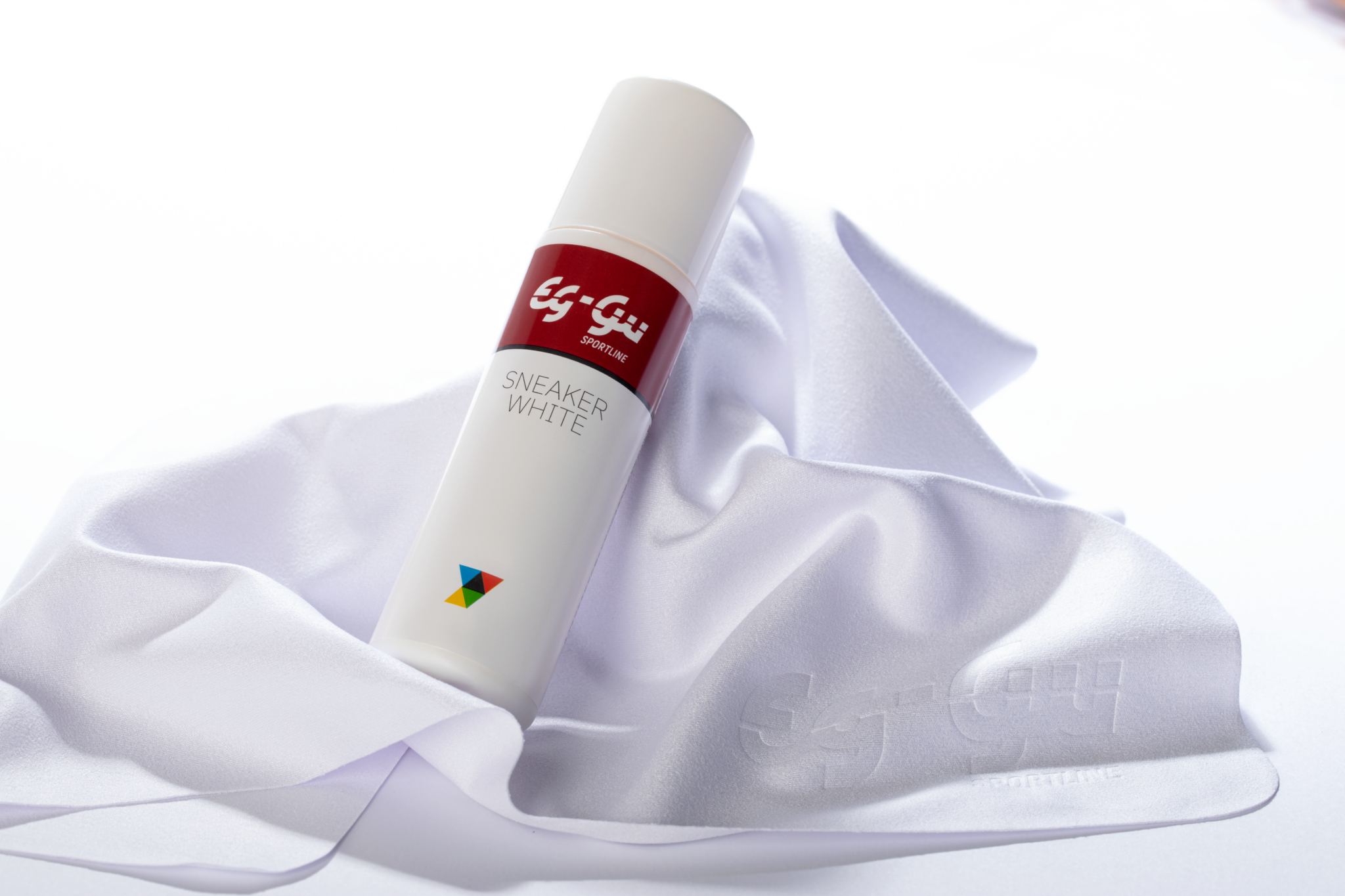 Spray bottle on a shoe cleaning cloth